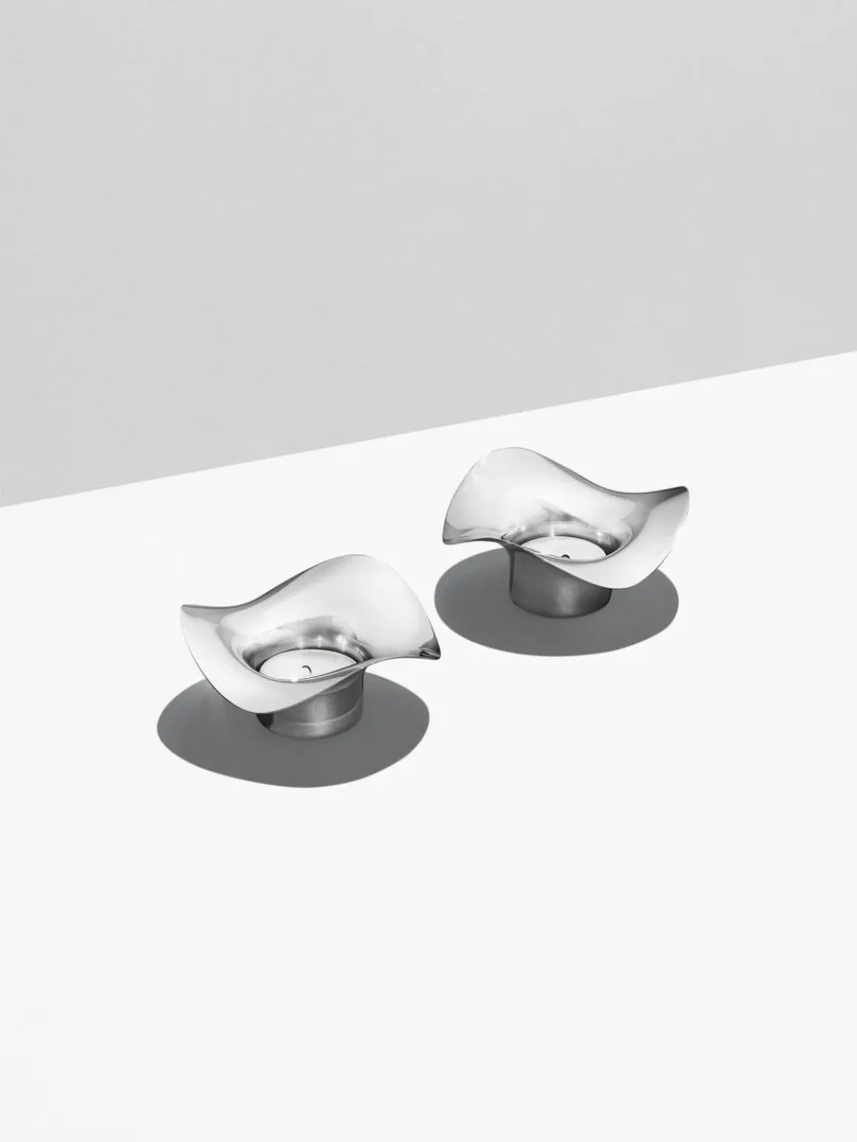 Georg Jensen Edelstahl-Teelichthalter Cobra in organischer Form, 2 Stück